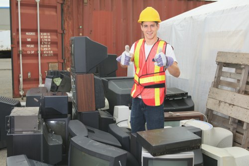 Construction site with builders waste being cleared