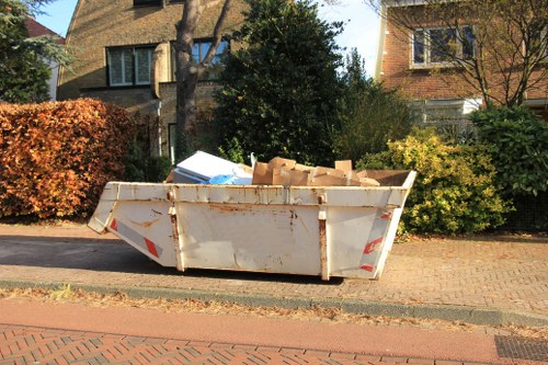 Tools used for garden clearance in a Crouchend garden